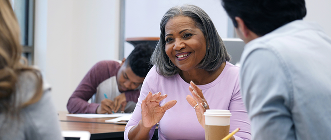 Woman taking notes during training